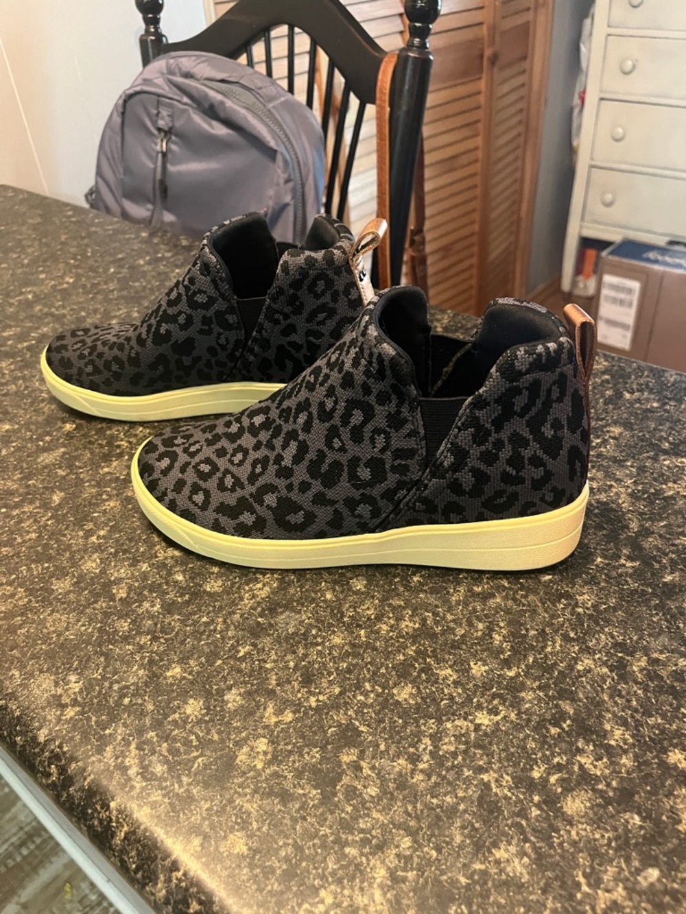 Ryka Black Leopard Print Slip-Ons with Pink Accent